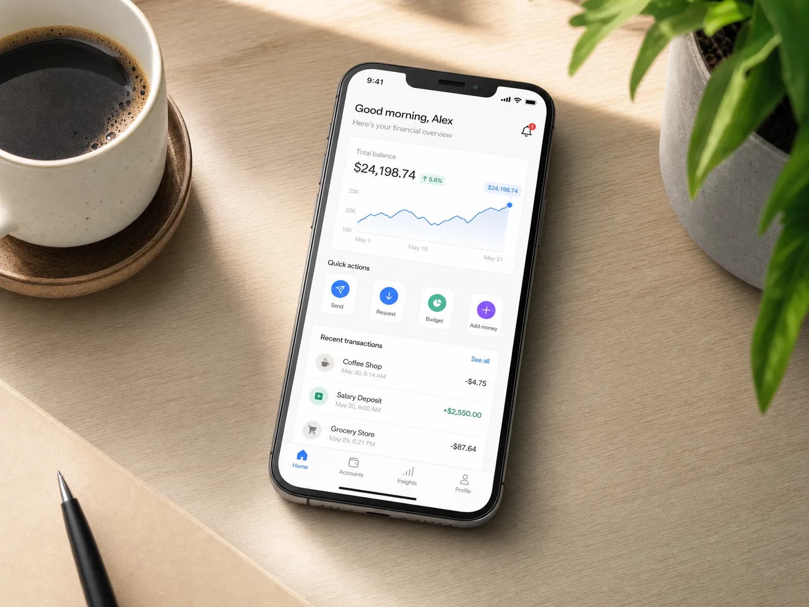 App interface mockup on a sunny desk